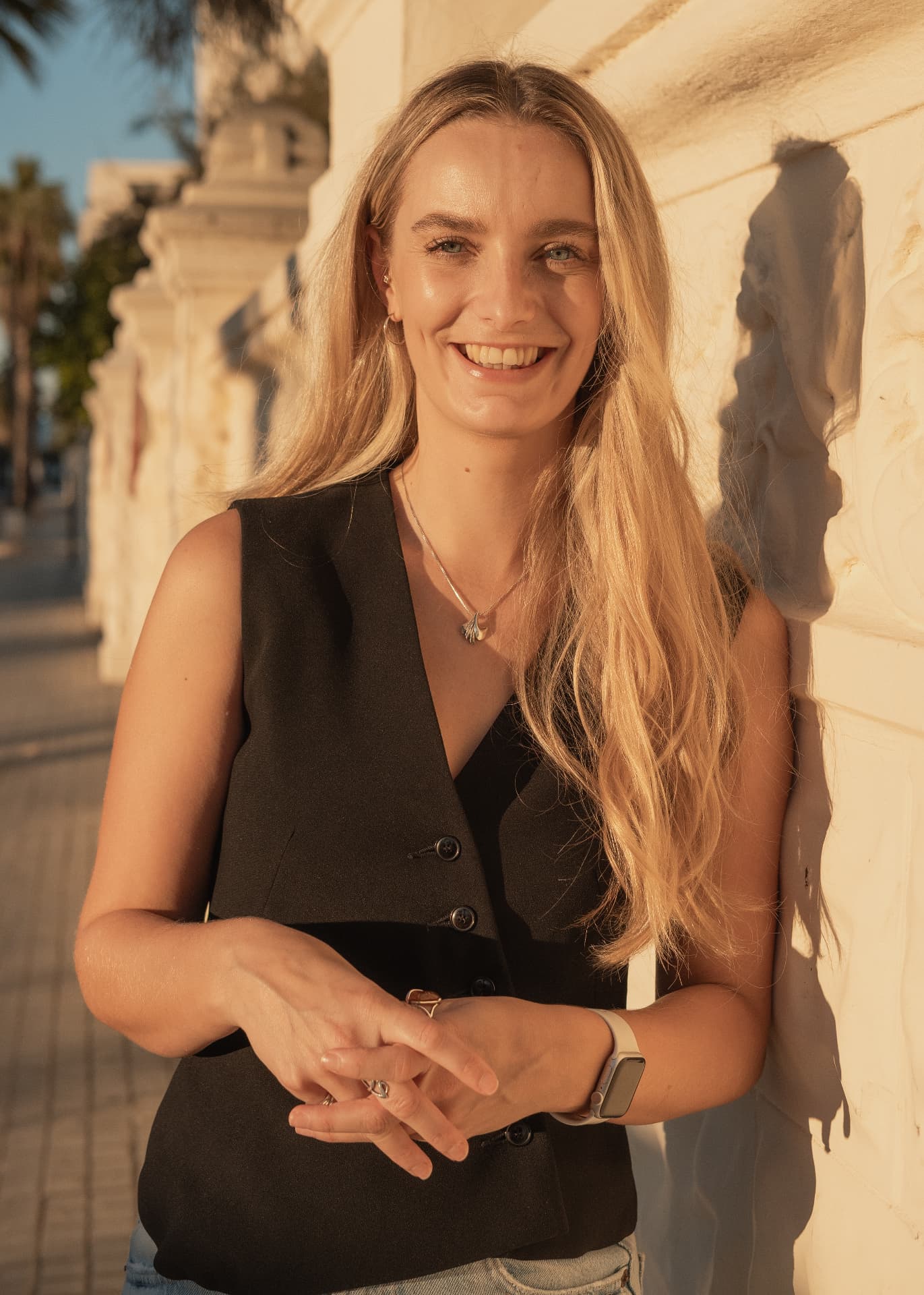 Caitlin, who opens Casa Piedra to retreat hosts, in warm evening light